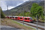 S1 1519 mit ABe 4/16 3105 verlässt Reichenau-Tamins. (27.04.2016)