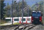 Ge 4/4 III 648  Susch  mit den beiden Glacier Express 906 und 908 von Zermatt nach St.Moritz bei der Ausfahrt aus Reichenau-Tamins Richtung Chur.