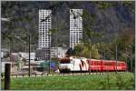 RE1145 mit Ge 4/4 III 649  Lavin  vor den City West Trmen in Chur.