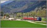 RE1140 mit Ge 4/4 III 652 bei Felsberg, wo die RhB immer noch gegen die Schlammflut aus dem Pargheratobel kmpft.