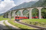 RhB Berninabahn ABe 4/4 III 56 und 55 mit einem Bernina-Express am 15. Juni 2019 bei Durchfahrt des Kreisviadukts Brusio.