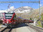 RhB Allegra ABe 8/12 3505 mit einem Regio St. Moritz- Tirano   als Bernina Express in Richtung Tirano am 10. Oktober 2019 in Alp Grüm.