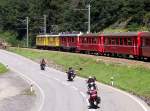 RE 1642 Tirano - St.Moritz am 15.07.2007 zwischen Brusio und Miralago. Unter den 524 Fotos in dieser Kategorie befindet sich bis jetzt kein Foto mit 3 Triebfahrzeugen vor einen Zug, auch keine gemischte Bespannung und keine gelben Traditionstriebwagen vor fahrplanmigen Regelzgen. 