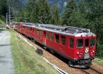 Zwei ABe 4/4, vorn Nr.47, mit Panoramawagen-Zug  am 11.07.2007 zwischen Cadera und Cavaglia, der Zug erklimmt hier auf 17 km zwischen Poschiavo und Alp Grm 1077 Hhenmeter in Serpentinen, der