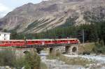 RhB Regionalzug 1639 von St.Moritz nach Tirano am 23.08.2007 auf Morteratsch-Brcke mit Triebwagen ABe 4/4 III 55 - ABe 4/4 III 53 - BD 2473 - AB 1545 - B 2466 - B 2463 - B 2493 - B 2462 - B 2468  