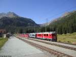 ABe 4/4''' 54 ''Hakone'' und 53 ''Credito Valtelinese'' am 8.9.2012 bei der Durchfahrt in Cavaglia als D 975 ''Bernina Express'' nach Tirano.