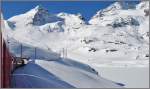 Kurz vor Ospizio Bernina 2253m /M. mit Lago Bianca, sowie Piz d`Arlas und Piz Cambrena. (15.04.2013)