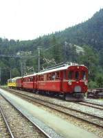RhB Aussichtswagen-Extrazug 3962 fr RHTIA TOURS von Alp Grm nach Pontresina am 30.08.1996 in Morteratsch mit Triebwagen ABe 4/4 I 34 - ABe 4/4 I 30 - D 4035 - B 2093 - B 2097.