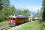 RhB - Alpin-Classic-Pullman-Express 3462 fr Graubnden Tours von Pontresina nach St.Moritz am 28.08.1998 zwischen Celerina Staz und St.Moritz mit Triebwagen ABe 4/4 III 51 - As 1141 - As 1144 - As