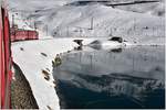 R1629 am Ufer des schwarz gefrorenen Lago Bianco auf dem Berninapass. Wer sich beeilt, kann es immer noch so erleben. (07.12.2016)
