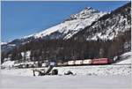 Güterzug nach Landquart mit der Ge 6/6 II 706  Disentis/Mustér  zwischen Samedan und Bever.