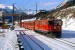 RhB - Regionalzug 1225 von Landquart nach Scuol am 15.12.2007 Einfahrt Scuol mit E-Lok Ge 6/6 II 703 - B - A - 3x B - D - B  