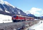 RhB ERSATZ-REGIONALZUG 344 von Pontresina nach Samedan am 07.03.1998 bei Punt Mutagl mit E-Lok Ge 4/4I 603 - B - B - B.
