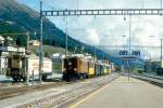 RhB EXTRAZUG fr RHTIA INCOMING 3246 von Zuoz nach St.Moritz am 09.09.1994 Einfahrt Samedan mit Oldtimer-E-Lok Ge 4/6 353 - B 2091 - B 2060 - A 1102 - B 2096 - WRS 3821.
