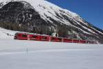 Anlässlich des Engadin Skimarathons 2014 mobilisierte die RhB das gesamte Rollmaterial. So wurde der RE 1327 Landquart-St. Moritz mit den beiden Stammnetz-Allegras ABe 4/16 3101 und 3105 geführt. Das Bild wurde am 09.03.2014 in Bever aufgenommen.  