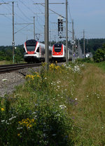 SBB: Mit viel Fotografenglück konnte am 7. Juli 2016 eine zufällige  Streckenbegegnung zwischen einem R Olten-Solothurn und einem ICN-Neigegezug bei Luterbach fotografiert werden.
Foto: Walter Ruetsch 