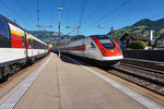 Der RABDe 500 009-1  Friedrich Dürrenmatt  durchfährt als ICN 865 (Zürich HB - Lugano), den Bahnhof Schwyz.
Auf dem linken Gleis zu sehen ist der IR 2316 (Chiasso - Basel SBB).
Aufgenommen am 19.7.2016.