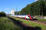 Eine SBB RABe 502 in seiner vollen Länge unterwegs zwischen Winterthur und Kemptthal auf dem dreispurigen Streckenabschnitt bei der Tössmühle in Winterthur.