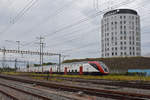 RABe 502 218-6 Twindexx durchfährt den Bahnhof Pratteln.