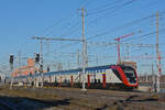 RABe 502 210-3 Twindexx durchfährt am 13.01.2025 den Bahnhof Muttenz.