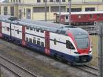 SBB - Triebkopf des Doppelstockzug RABe 511 002-1 hinter dem SBB Depot in Biel am 26.02.2011