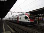 RABe 511 111 am 16.11.2012 in Renens als RE nach Genf. Zum Zeitpunkt der Aufnahme war dieser Zug noch einmal 10 Tag in Betrieb.