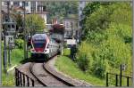 511 018 mit RE3775 nach Zrich HB bei Neuhausen am Rheinfall.