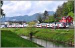 RE3913 nach Chur mit 511 026 am Binnenkanal in Au SG. (22.04.2014)