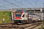 RABe 511 019 durchfährt den Bahnhof Muttenz. Die Aufnahme stammt vom 17.06.2015.