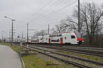 RABe 512 001-4 KISS fährt am 11.12.2024 Richtung Bahnhof Rheinfelden.