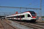 RABE 521 015 auf der S1 fährt beim Bahnhof Muttenz ein. Die Aufnahme stammt vom 08.09.2014.