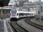 SBB - Triebzug RABe 523 027 bei der einfahrt im Bahnhof Lausanne am 11.01.2014