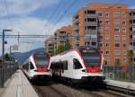 SBB: Zusammentreffen von den Regionalzügen nach Solothurn und Biel mit den FLIRTS RABe 523 054 und RABe 523 033 auf der neuen Haltestelle Solothurn Allmend am 8. Mai 2015.
Foto: Walter Ruetsch