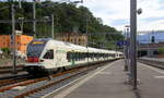 Der Trennord ETR 524 202 als S10 fährt in den Bahnhof von Bellinzona(CH) ein.
Aufgenommen vom Bahnsteig 3 in Bellinzona(CH). 
Am Abend vom 28.7.2019.