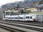 bls - NINA Triebzug RABe 525 038-6 im Bahnhofsareal von Spiez am 24.03.2012