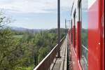 Mit dem RBDe 566 I 222 des VPM am 27.4.24 auf dem Grandvey-Viadukt.