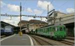 Bunte Bahn: SBB Re 460 005-2  RailAway , SBB Re 460 055-7 mit IR nach Brig und Makies AG BDe 576 049-1 in Lausanne am 13. April 2012