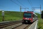 Der SBB Bem 550 001-2  La Donzelle  erreicht als RER 96746 von Genève kommend den Halt Russin.