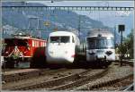 75 Jahre Arosabahn Fahrzeugparade. Parallelfahrt in den Bahnhof Chur mit Ge 6/6 II 701  Rtia , ICE Experimental(vierteilig) und RAe TEE Graue Maus. (Archiv 05/89)
