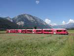 Die ABe 4/16 3101 mit ein  Regio  von Chur nach Thusis - Hier, zwischen Reichenau-Tamins und Bonaduz, 20-06-2018... Im hintergrund, die Felsberger Calanda mit 2695 m. hohe.