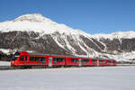 Nochmal RhB Rot am 16.01.2025 in der Früh zwischen Samedan und Punt Muragl.