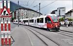 R1464 mit ABe 8/12 3512 aus Arosa trifft in Chur ein.