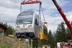 Der Be 4/6 101  Eiger  wurde am 13.5.24 auf der Winteregg vom Transporter gehoben.