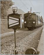 Ein Neuauflage des vor gut 9 Jahren bereits gezeigten Bildes des BCFe 4/4 15 welcher mit seinem Steuerwagen im Rahme des Blonay-Chamby Themen-Veranstaltung  Le Valais en fête sur le B-C  als