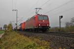 Am 22.11.2013 fuhr 145-CL 014 von Ascendos Rail/Crossrail mit einem bunten Kistenzug in Müllheim (Baden) gen Basel.