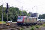 185 594-9 von Crossrail rangiert in Aachen-West. Aufgenommen vom Bahnsteig in Aachen-West bei Sonne und Wolken am Mittag vom 4.8.2014. 