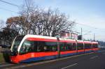 Serbien / Straßenbahn Belgrad / Tram Beograd: CAF Urbos 3 - Wagen 1505 der GSP Belgrad, aufgenommen im Januar 2016 in der Nähe der Haltestelle  Blok 21  in Belgrad.