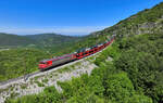 363 009 mit einem Autozug am 10.05.2024 bei Zanigrad.