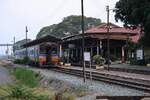 LOC 402 (Phitsanulok - Lop Buri) mit dem NKF 1259 als letztes Fahrzeug am 29.März 2023 in der Ban Takhli Station.