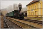 310 093 (ex kkStB 97.194) mit ihrem Dampfsonderzug von Ceske Budejovice nach Nova Pec am 19.11.2011 bei der Einfahrt in Horice.